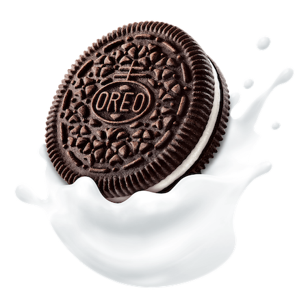 OREO cookie being dunked in milk
